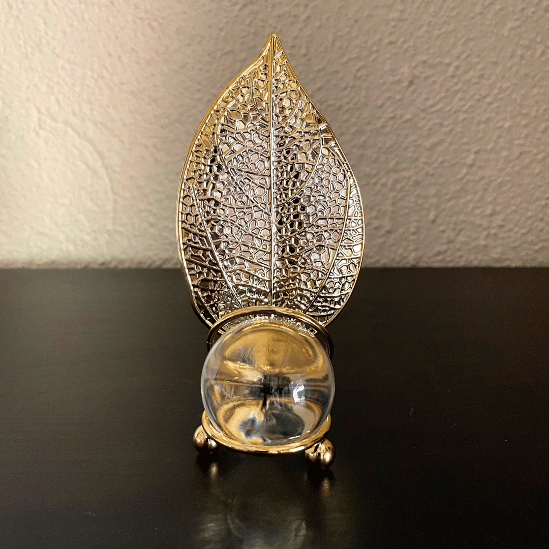 Esfera con Hoja Dorada - Cristal / Metal Texturizado / 15 x 8 x 5 cm - Disponible en Dreamy Home!